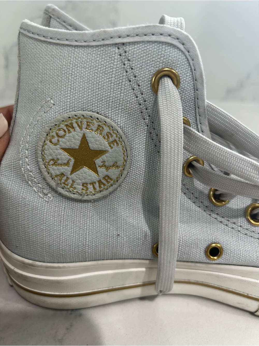 Converse White High Top Sneakers with Gold Accents